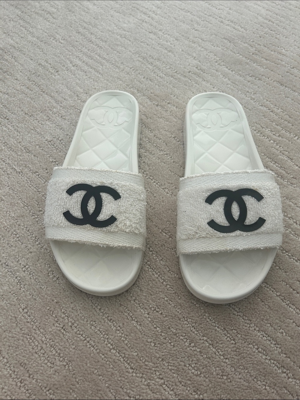 CHANEL White Slides with Black CC Emblem
